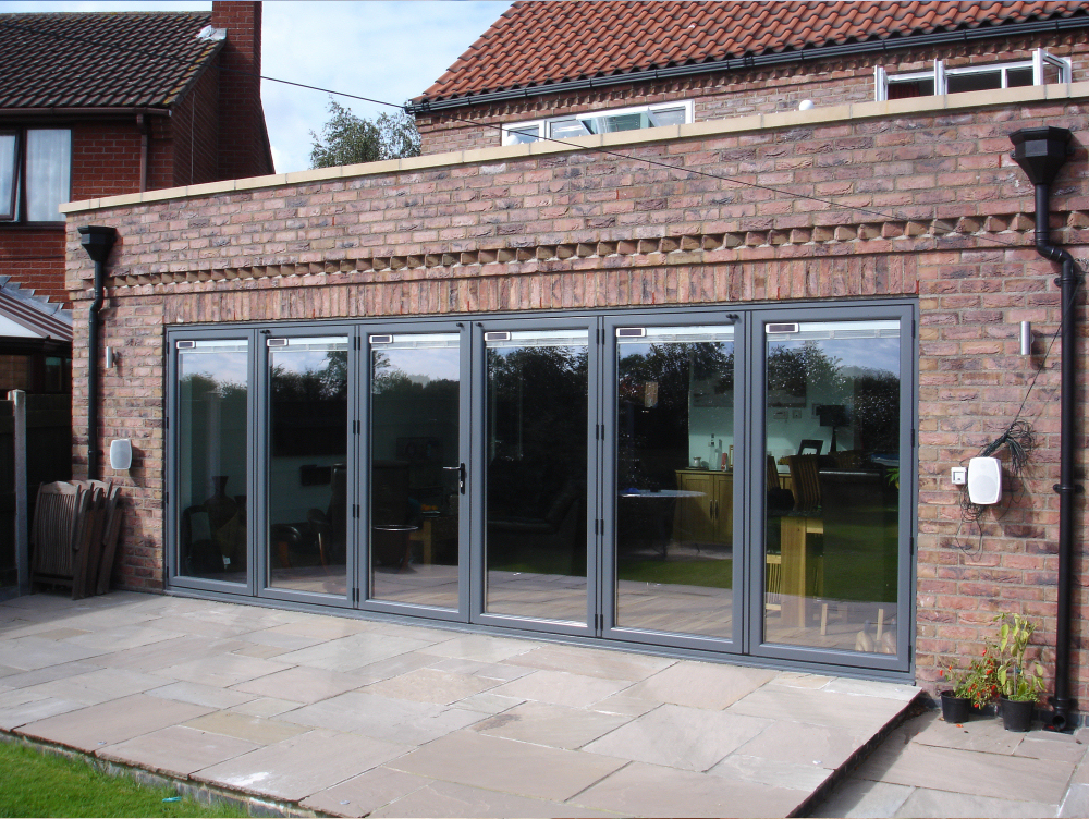 Classic Orangery With Bifolds And Integrated Blinds.